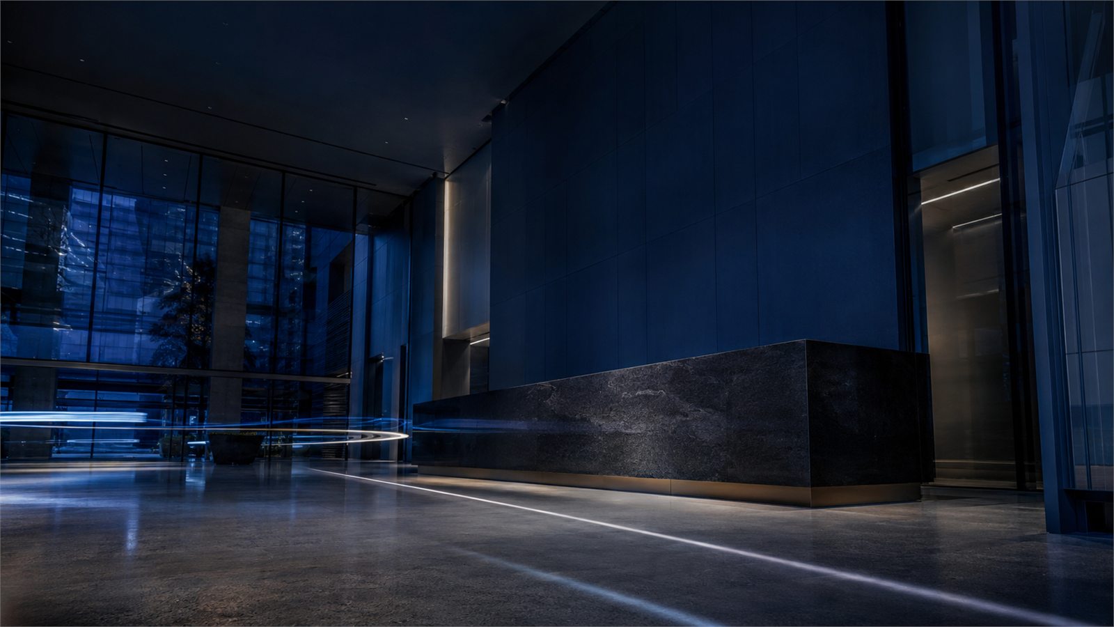 The lobby corridor of Montlior House lit in the evening.