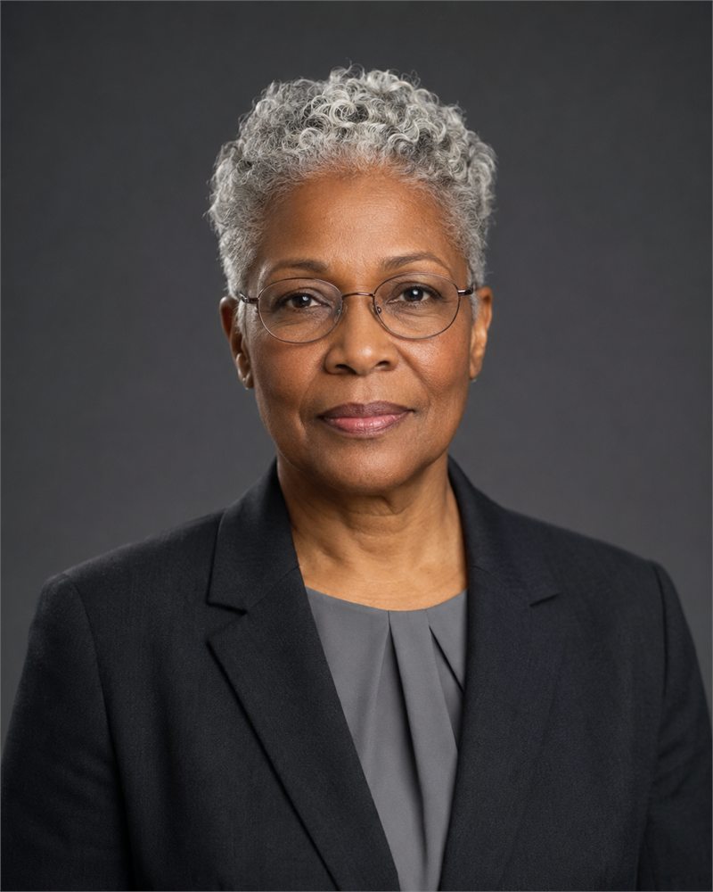 Beatrice Okonkwo, Deputy Chair and Senior Independent Director of Montlior Group, in a dark suit.